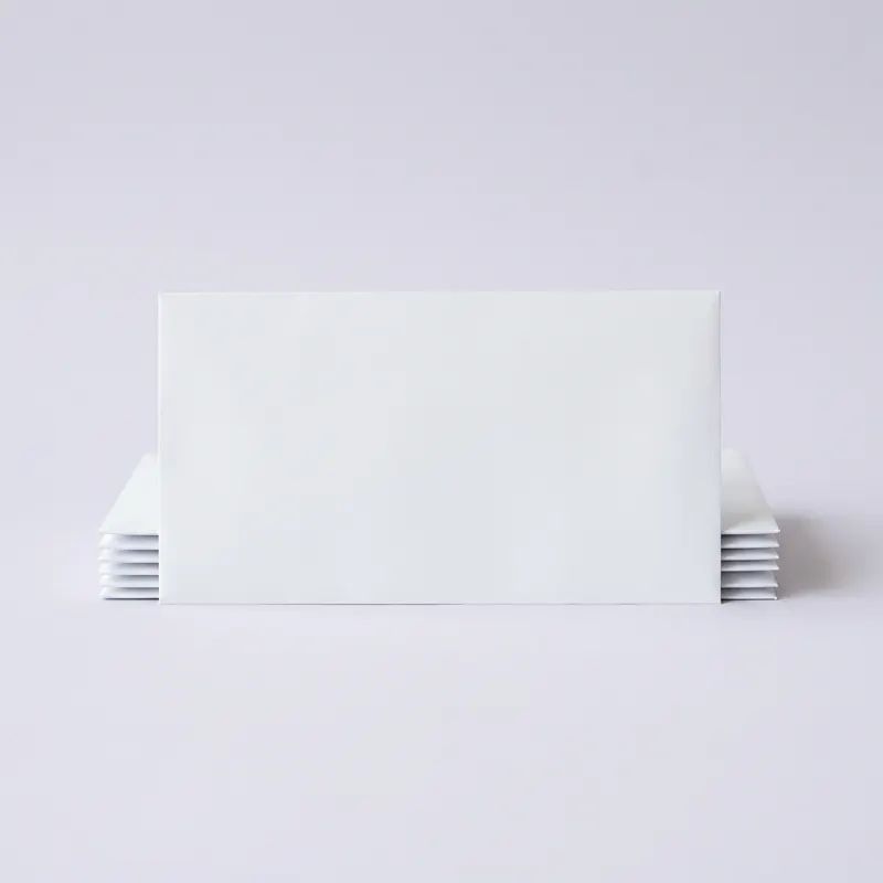Printed envelopes, Classic, shown with a made-up business, Harbrook Plumbing